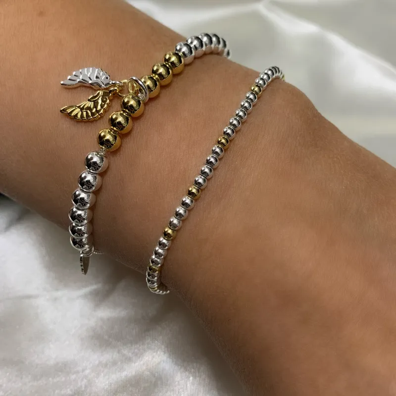 Estella Bartlett Angel Wings Bracelet Set of 2 Silver and Gold Bracelets