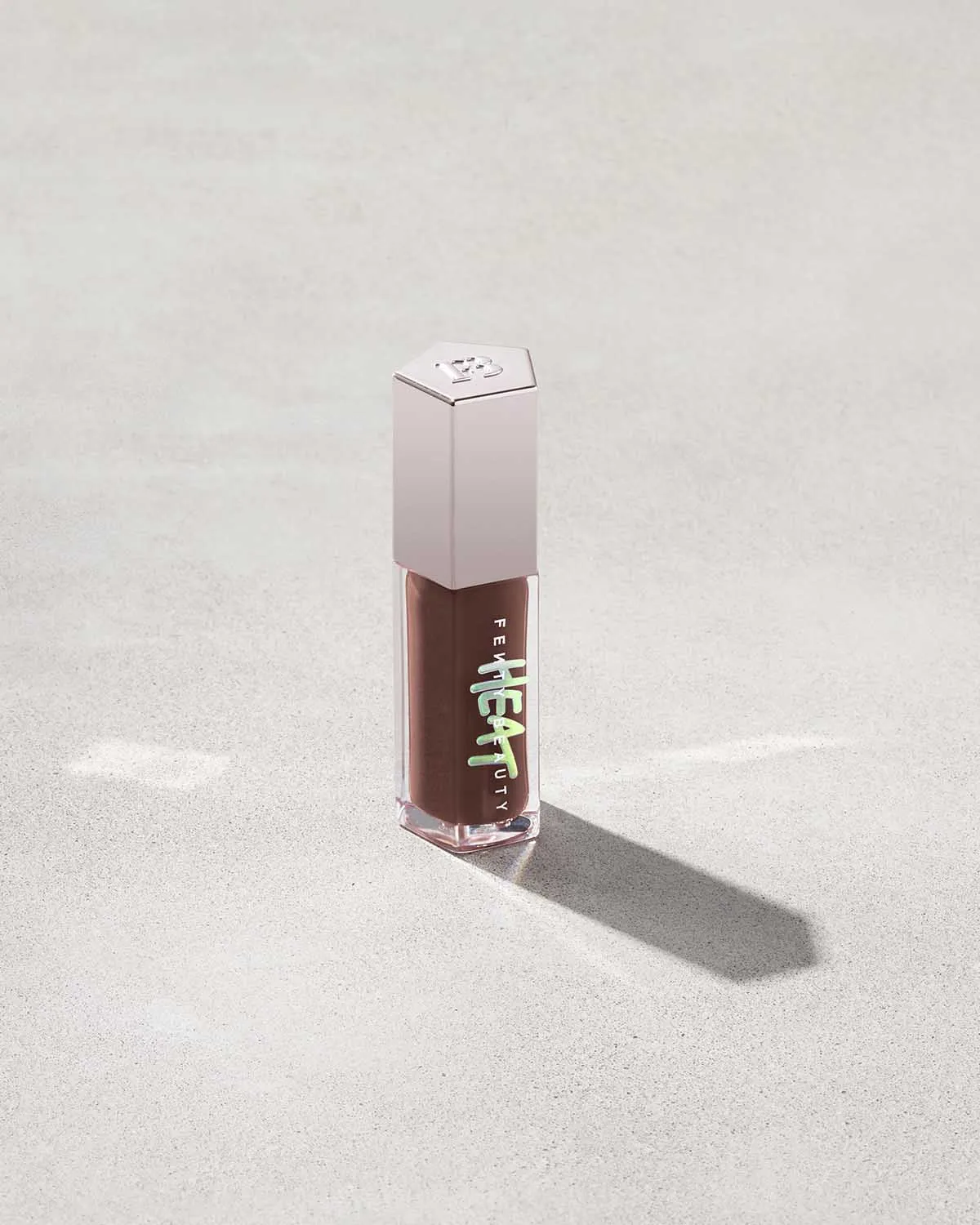 FENTY BEAUTY BY RIHANNA  GLOSS BOMB HEAT UNIVERSAL LIP LUMINIZER   PLUMPER  (hot chocolit heat 04)
