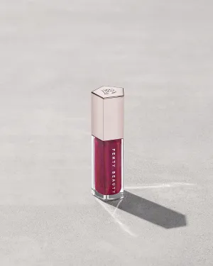 FENTY BEAUTY BY RIHANNA GLOSSBOMB UNIVERSAL LIP LUMINIZER (FUSHIA FLEX)