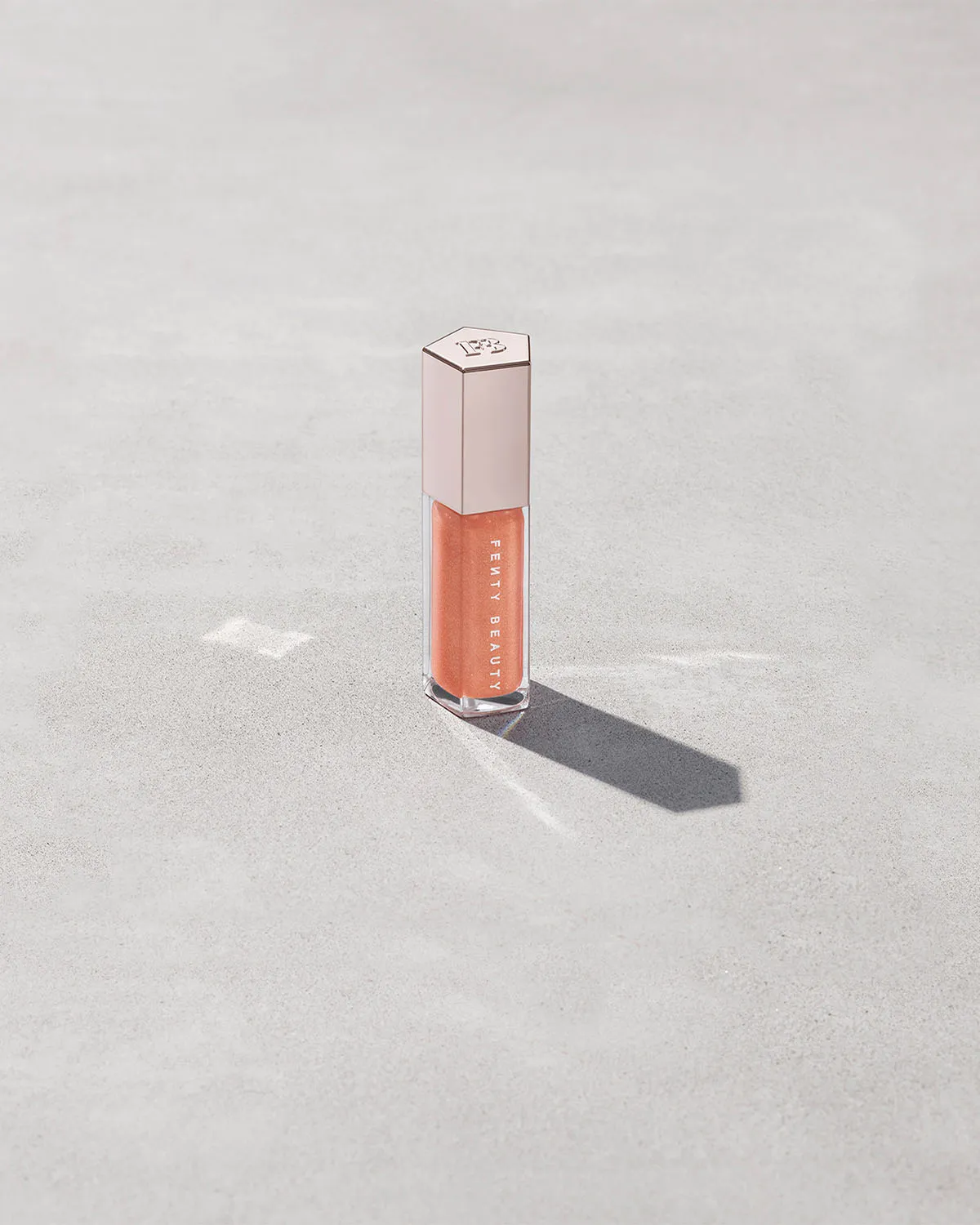 FENTY BEAUTY BY RIHANNA GLOSSBOMB UNIVERSAL LIP LUMINIZER (HOT COCOLIT ) (Copy)